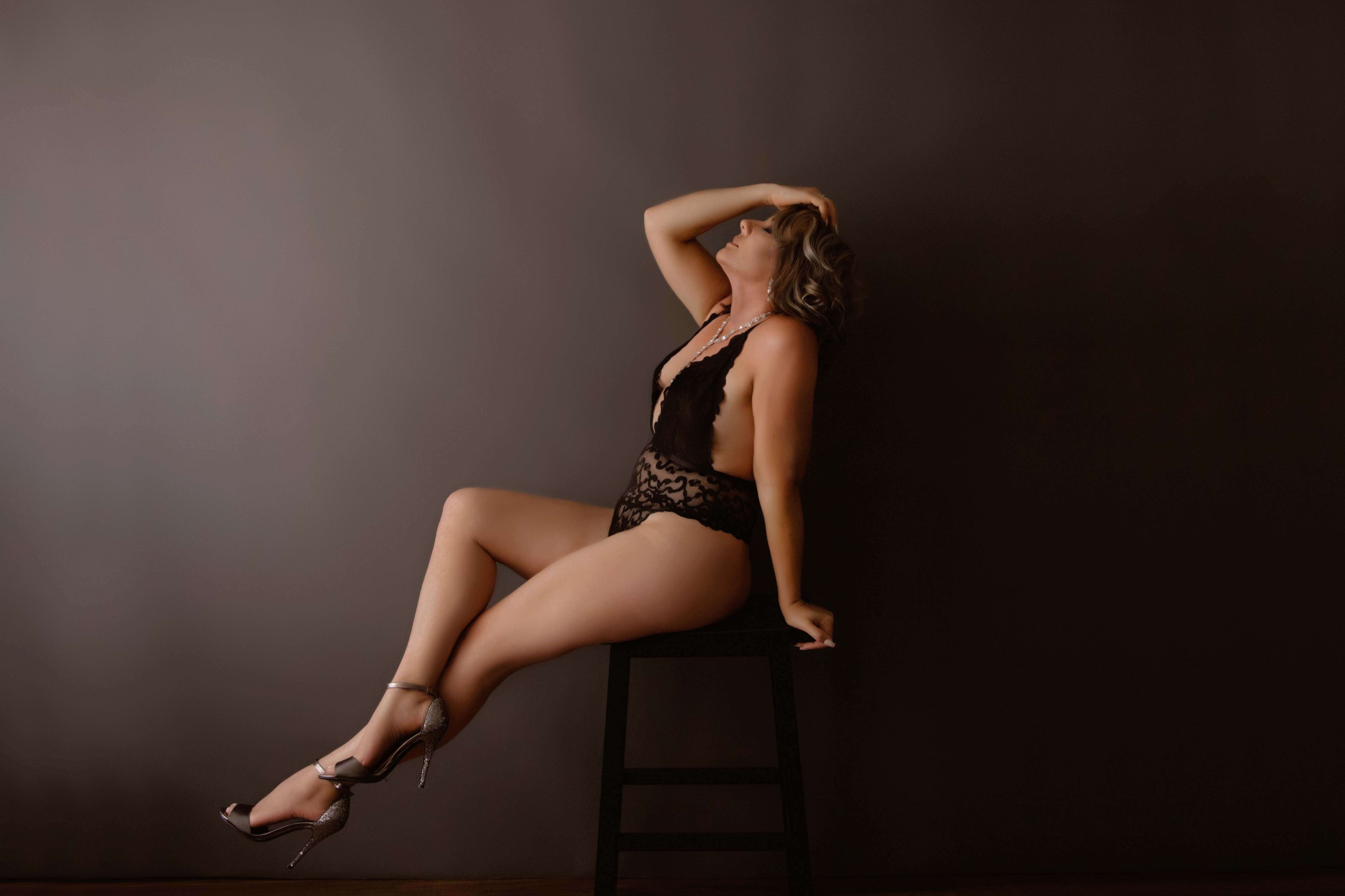 Blonde with black lingerie studio boudoir photoshoot
